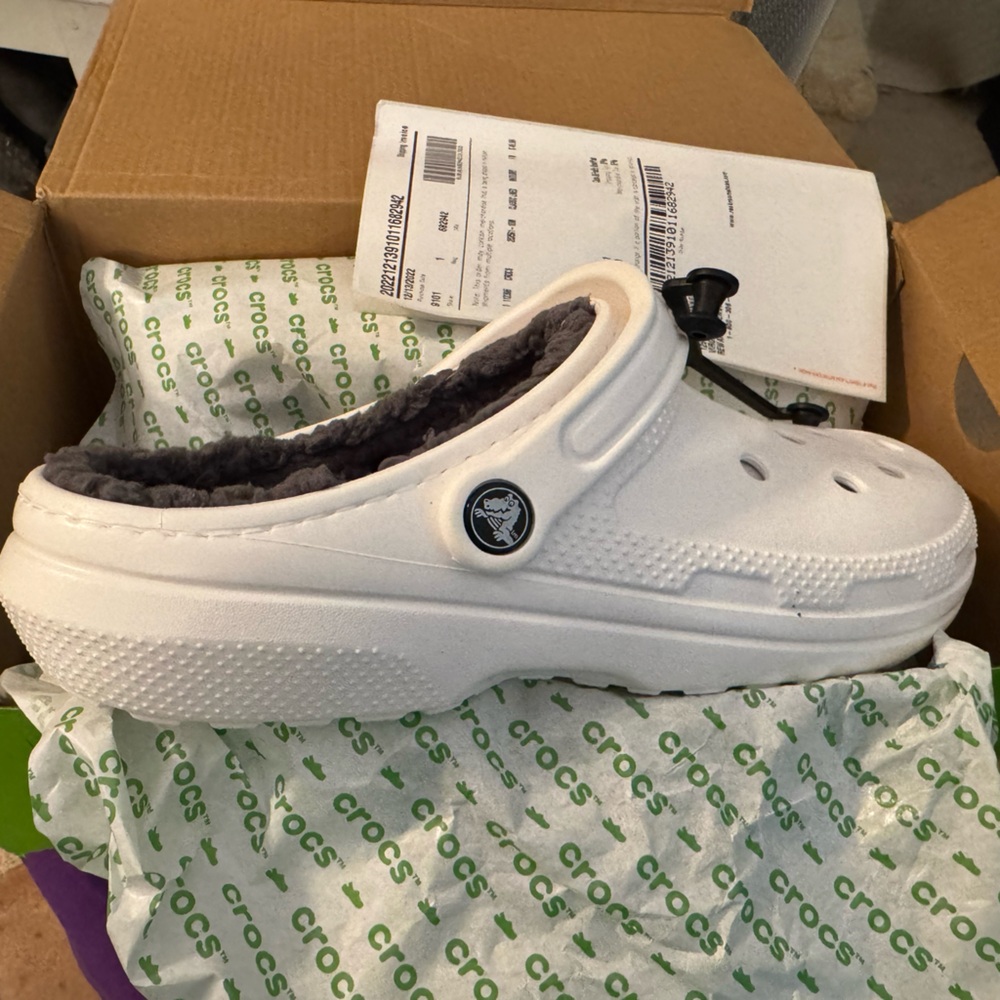 Brand new Crocs with soft fuzzy liner to keep you warm